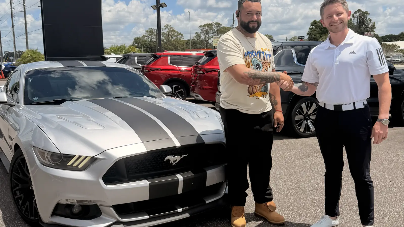 Josh with a client on delivery day