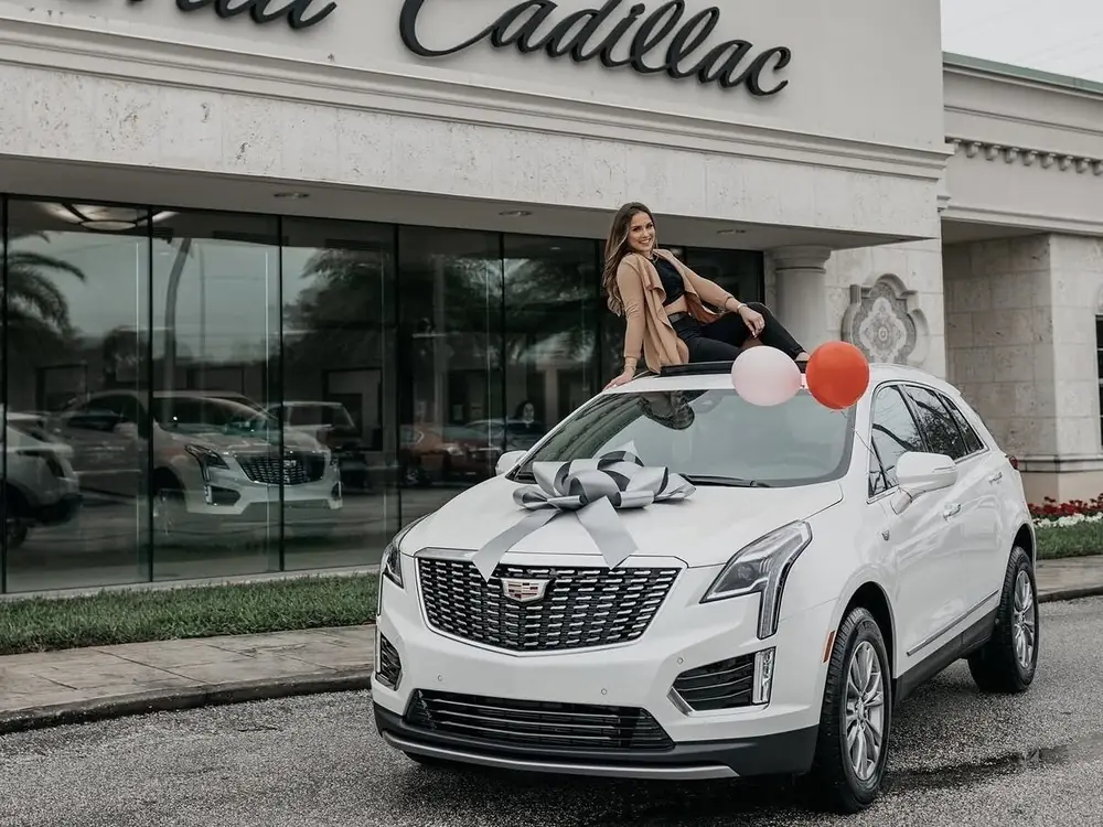 Sophia with her new Cadillac XT5