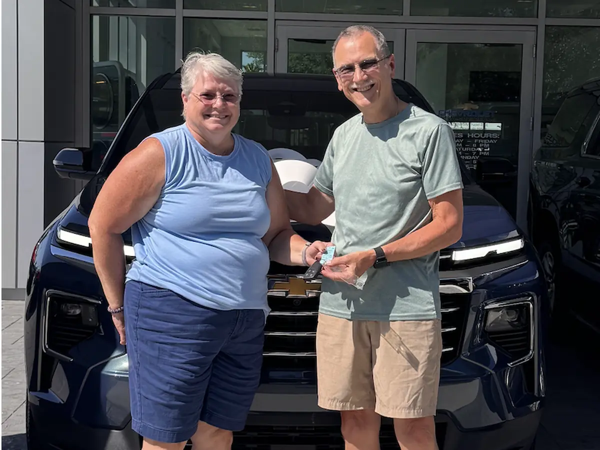 Clients taking delivery of a Chevrolet Traverse
